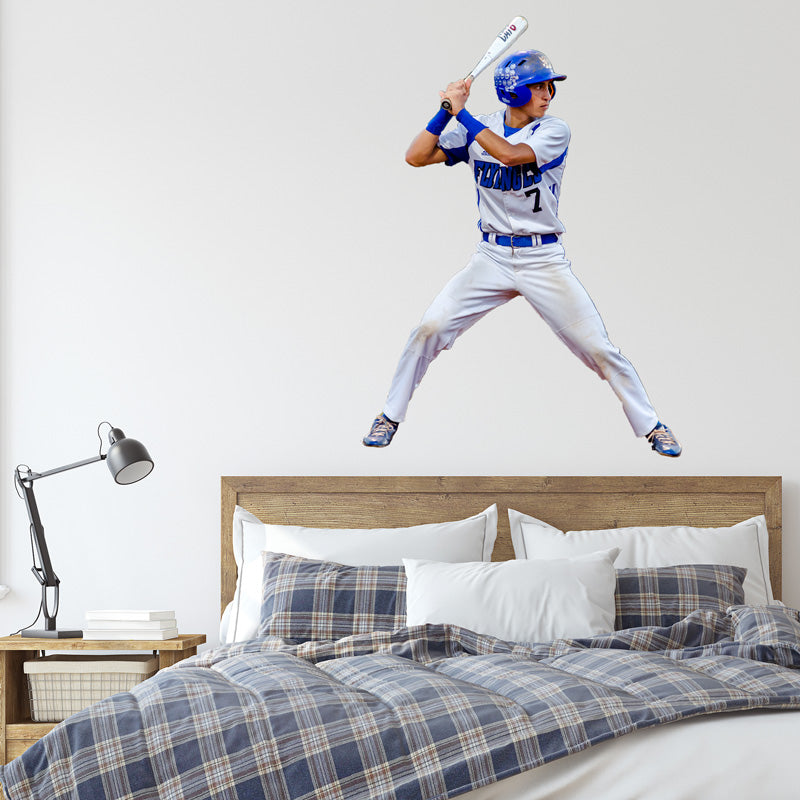 Wall Decal Above a Bed of a Boy Playing Baseball
