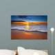 Sunrise light shining on ocean waves. Wall Mural