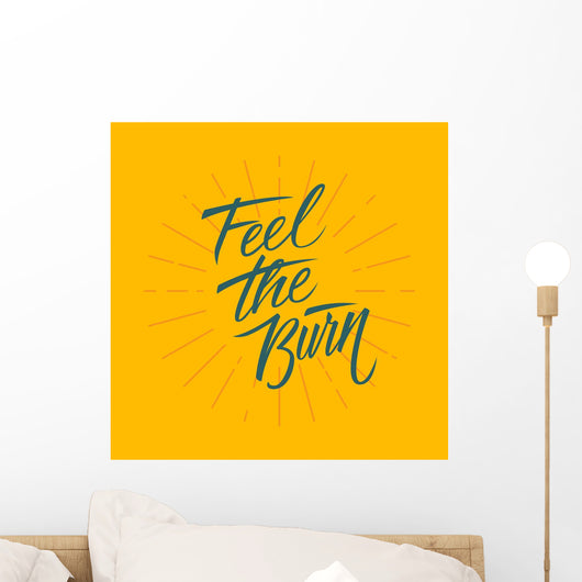 Feel the burn. Workout and fitness motivation quote. Vector lettering. Wall Mural