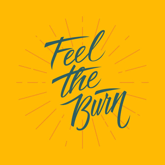 Feel the burn. Workout and fitness motivation quote. Vector lettering. Wall Mural