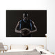 Portrait of basketball player holding a ball Wall Mural