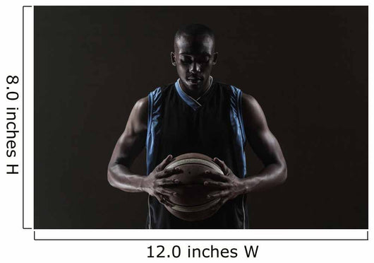 Portrait of basketball player holding a ball Wall Mural