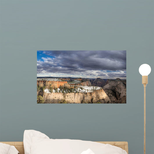 Hiking the west rim of Zion National Park the morning after a spring snow storm. Wall Mural