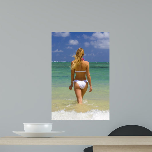 Beautiful Young Blond Woman in a Bikini Wall Mural