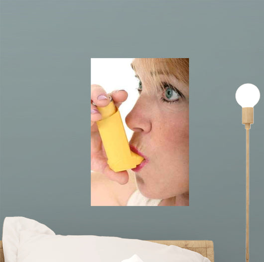 Woman Using Asthma Inhaler Wall Mural