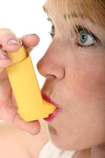 Woman Using Asthma Inhaler 2 Wall Mural