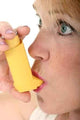 Woman Using Asthma Inhaler 2 Wall Mural