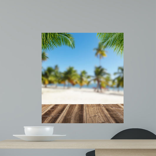 Empty wooden planks with blur beach on background Wall Mural