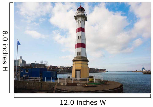 Old striped lighthouse in Oresund, Malmo city harbour Wall Mural