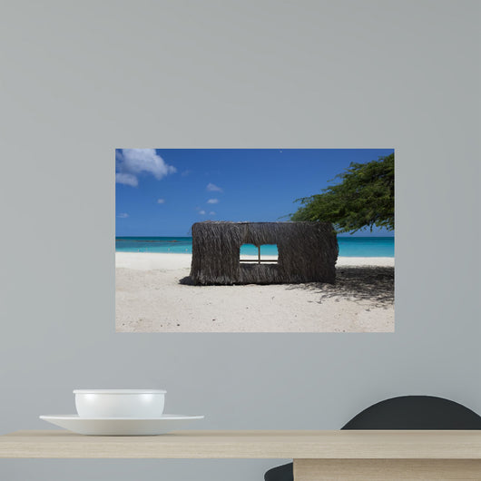 Beach hut on caribbean coast in Aruba Wall Mural