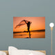 Silhouette of girl running on the beach Wall Mural