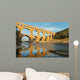 Famous Pont Du Gard reflecting in Gardon river in Southern France Wall Mural