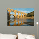 Famous Pont Du Gard reflecting in Gardon river in Southern France Wall Mural