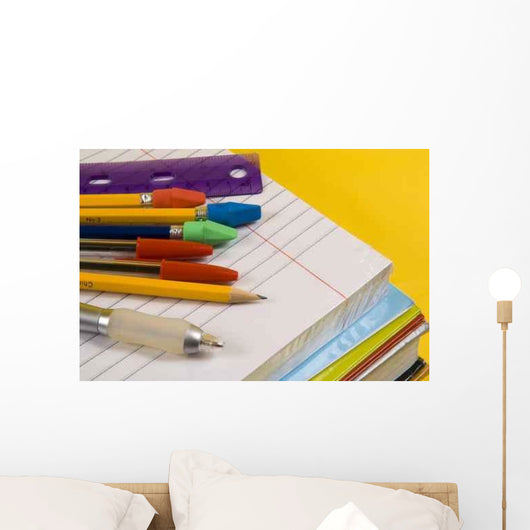 School Supplies on Yellow Background Wall Mural