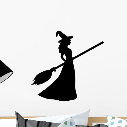 Young witch with a broom silhouette Wall Decal