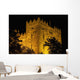 Bunratty Castle lit against black sky Wall Mural