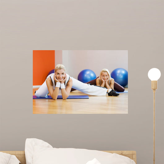 Group of people doing stretching exercise Wall Mural