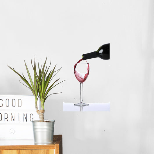 Red wine poured on glass Wall Decal