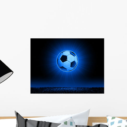 Soccerball with grass horizon line Wall Mural