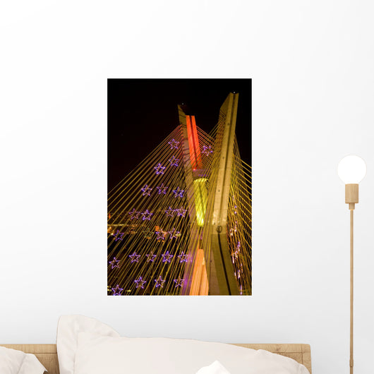 Awesome bridge lit up at night Wall Mural