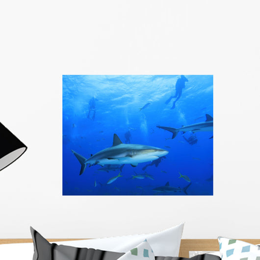 Shark With Scuba Divers Silhouetted in Background Wall Mural