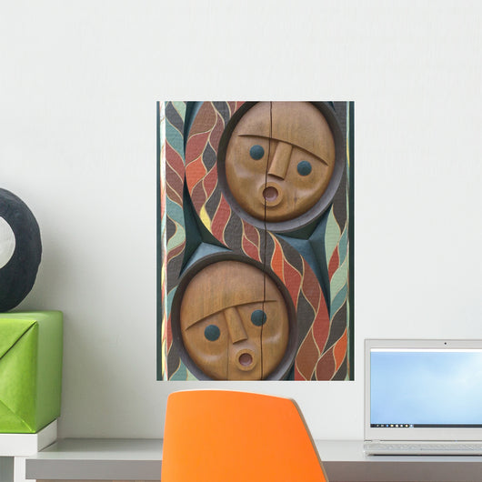 Detail of a North American Totem Pole with people faces Wall Mural