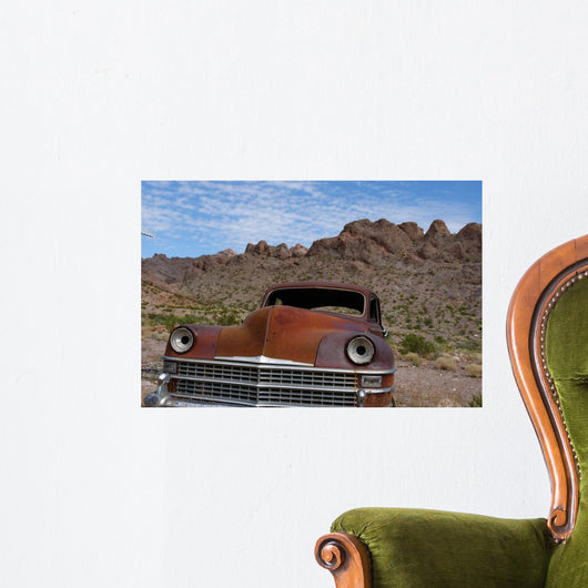 Rusted classic car in the desert near Las Vegas Wall Mural