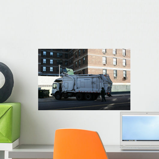 garbage truck emptying dumpsters Wall Mural