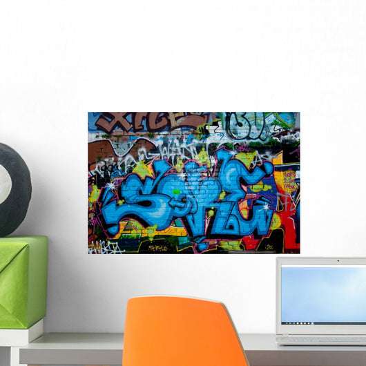 Graffiti Detail on the Textured Brick Wall Wall Mural