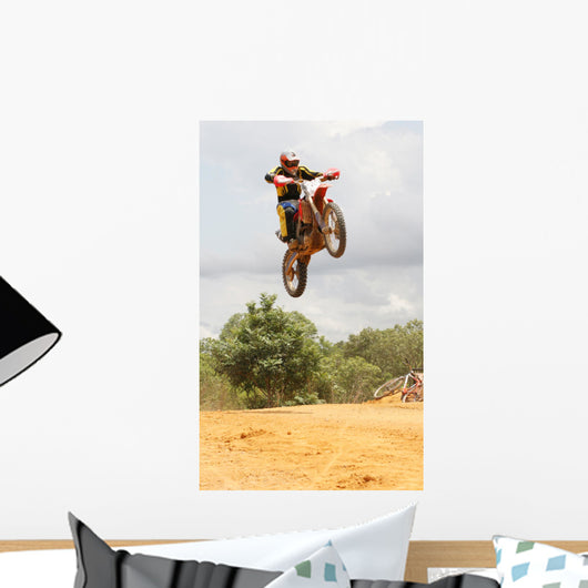 Motorcross Motorcycle Rider Flying through Air Wall Mural