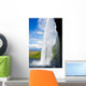 waterfall in a green landscape in Iceland Wall Mural