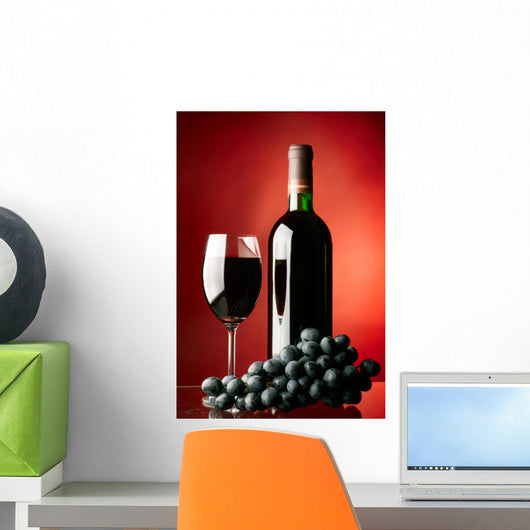 Glass and bottle of red wine. Wall Mural