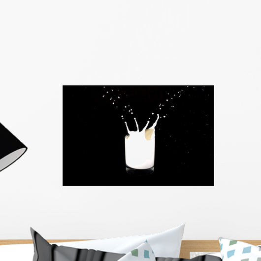 milk splashing in a glass Wall Mural