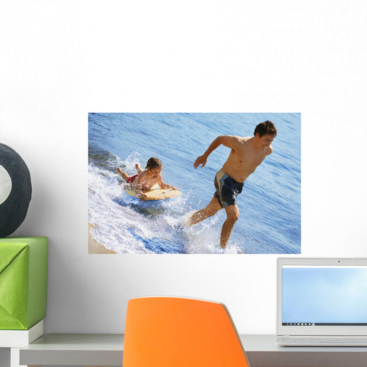 Playing In Water Wall Mural