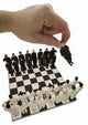 Chess Being Played With Little People Wall Mural