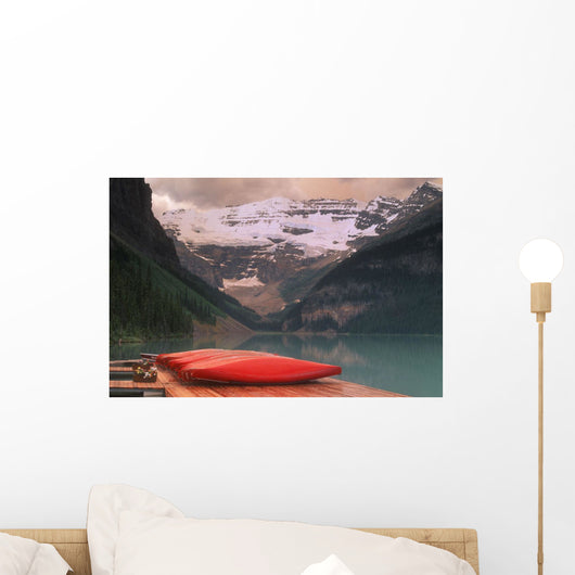Canoes Lined On A Dock Wall Mural
