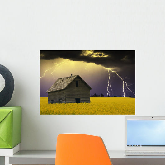 An Abandoned Farm Building With Lighting In The Background Wall Mural