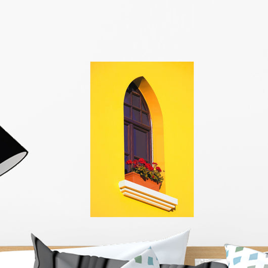 A Window In A Bright Yellow Wall Wall Mural