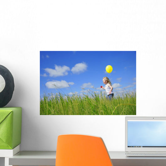 Child Running With A Balloon Wall Mural