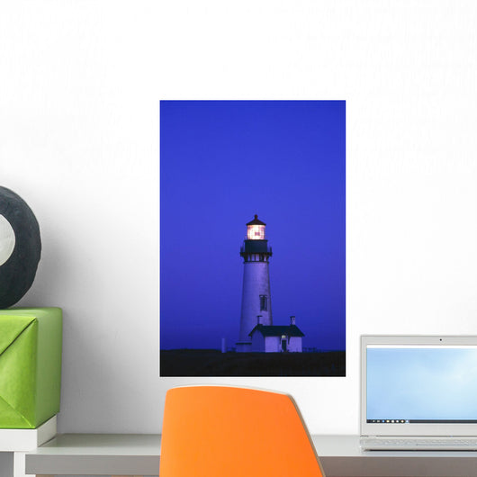 Illuminated Yaquina Head Lighthouse At Dawn Wall Mural
