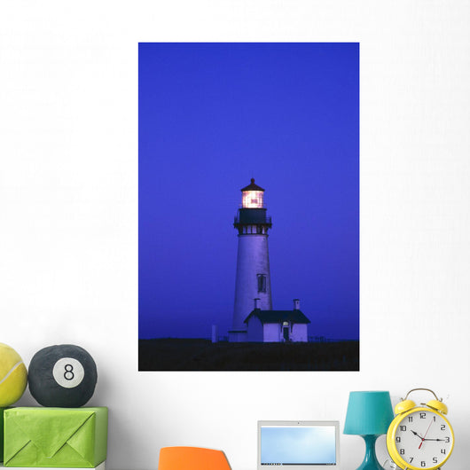Illuminated Yaquina Head Lighthouse At Dawn Wall Mural