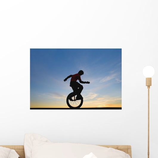 Man On Unicycle Wall Mural