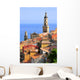 Basilica of St. Michael the Archangel and roofs of Menton in France Wall Mural