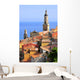 Basilica of St. Michael the Archangel and roofs of Menton in France Wall Mural