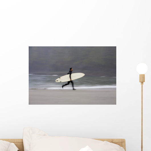 A Surfer, Running With Board Along The Shoreline Wall Mural