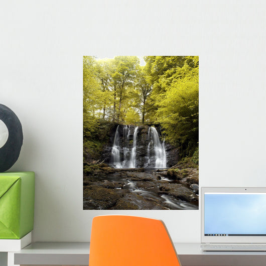 Low Angle View Of A Waterfall In A Forest Wall Mural