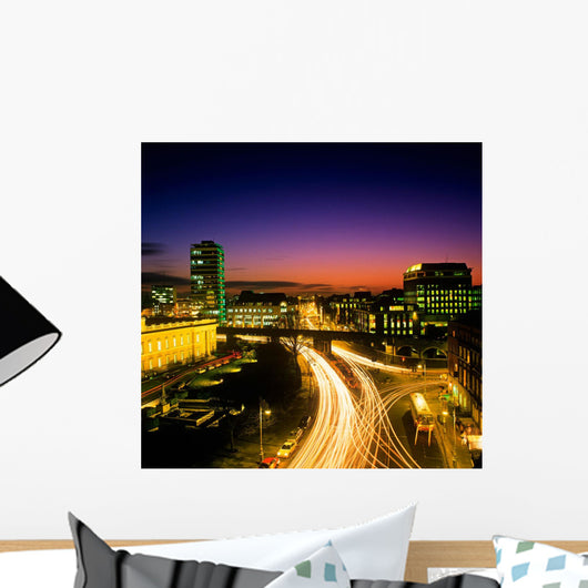 High Angle View Of Traffic Moving In A City At Dusk Wall Mural