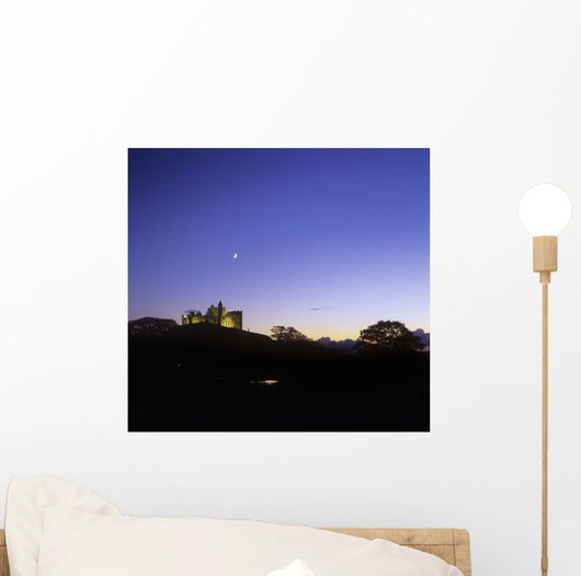 Silhouette Of A Castle On The Cliff Of A Mountain Wall Mural