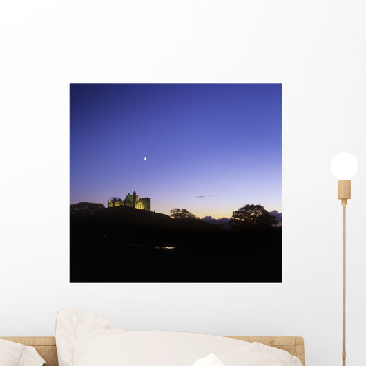 Silhouette Of A Castle On The Cliff Of A Mountain Wall Mural