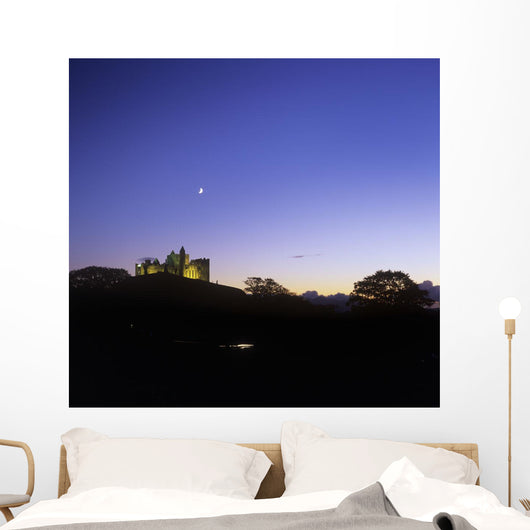 Silhouette Of A Castle On The Cliff Of A Mountain Wall Mural